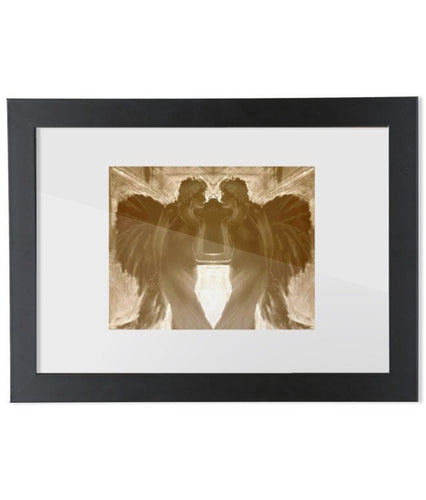 The Watchers, a sepia-toned limited edition print of angels, printed on sustainable bamboo paper and framed in a matte black wooden frame.